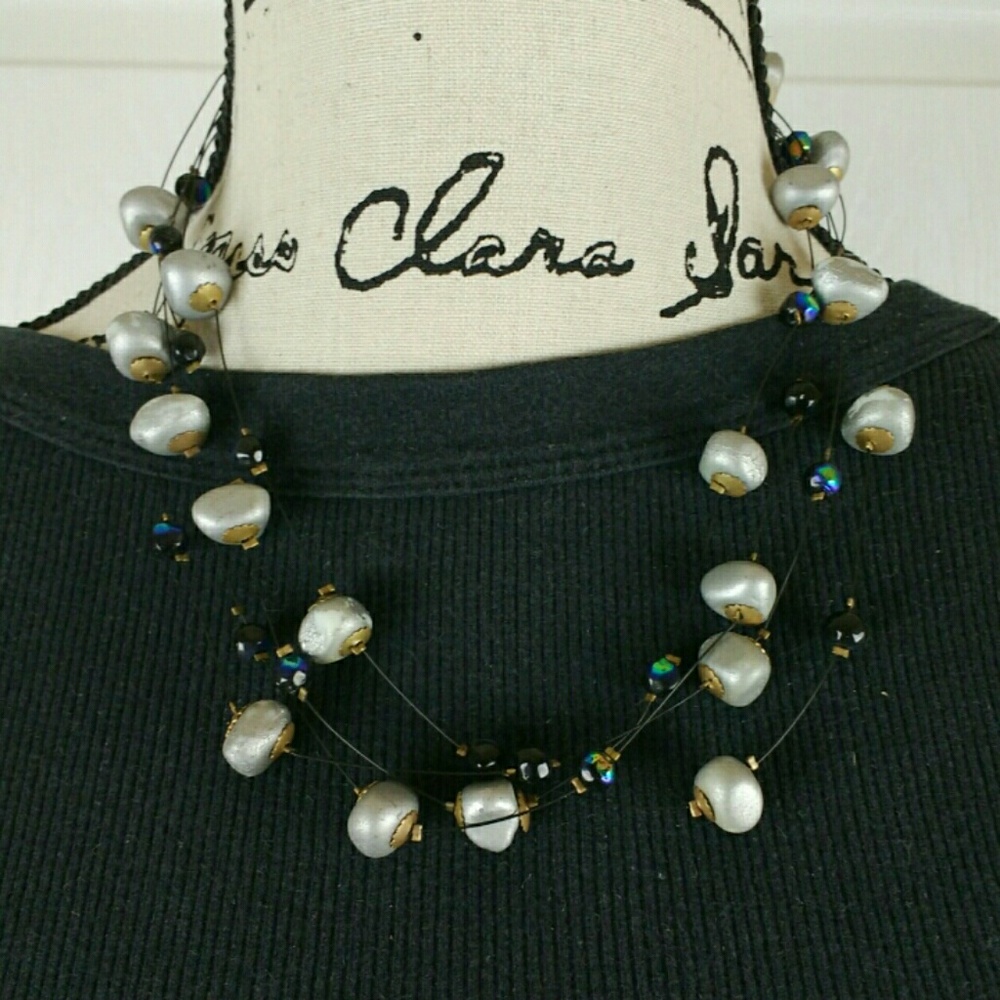 Gray & iridescent beaded necklace on dark wires